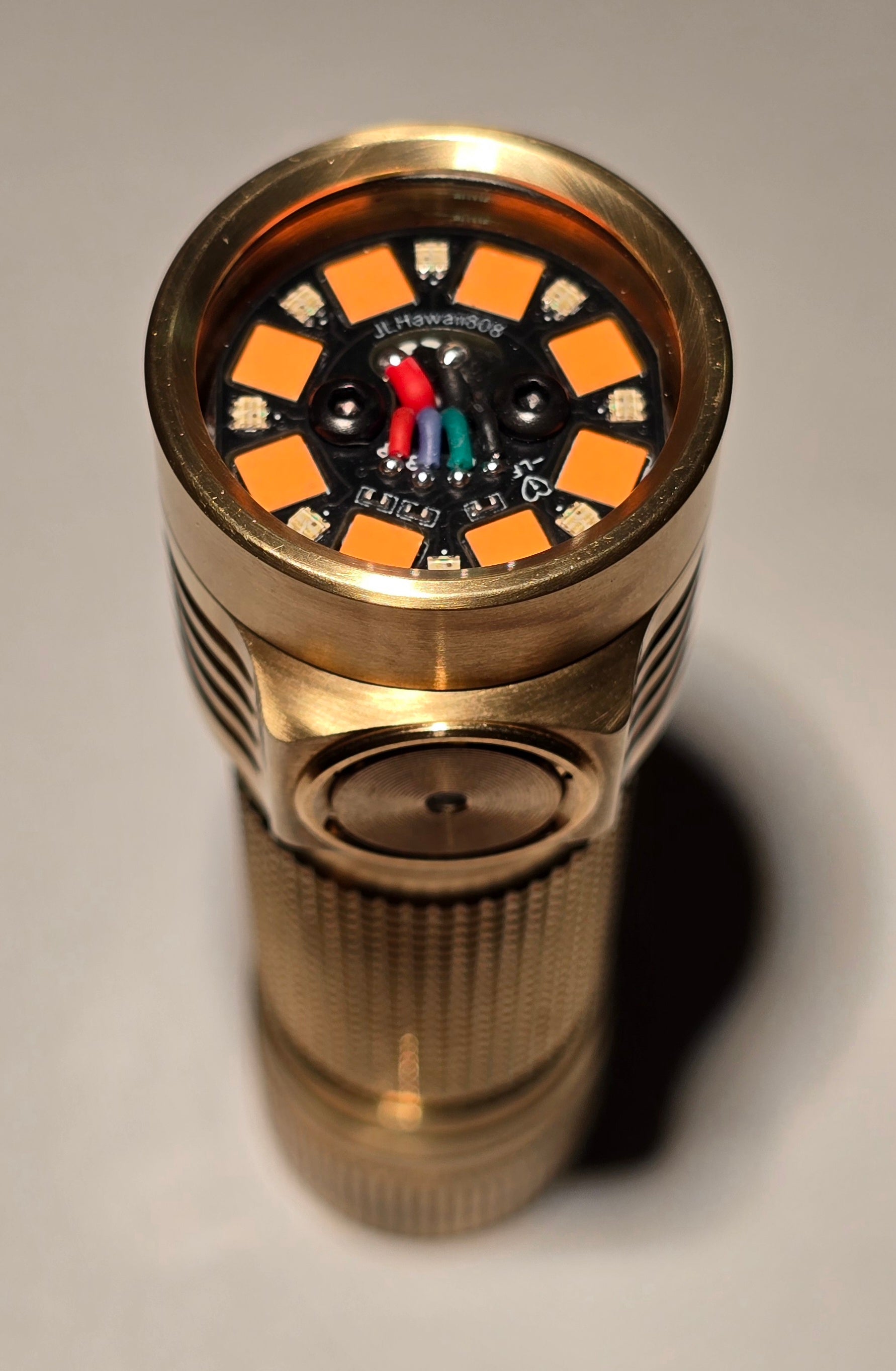 brass rechargeable flashlight Emisar D4V2 Titanium/Copper/Brass 17 x LED " MEGA MULE" High Power LED JLHawaii808 the pure Bronze will change its color slowly because of oxidation when exposing to the air and what is the most awesome and surprising thing is its color will show much historical play. Emisar D3AA Brass 14500/AA LED